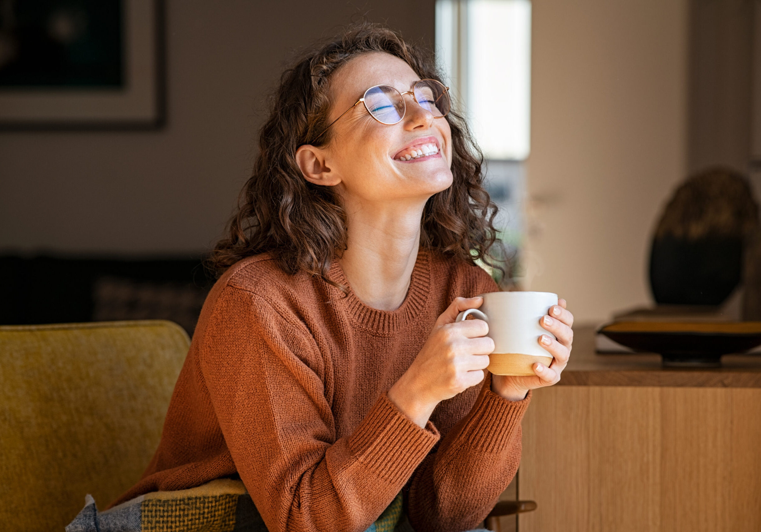 Portrait,Of,Joyful,Young,Woman,Enjoying,A,Cup,Of,Coffee